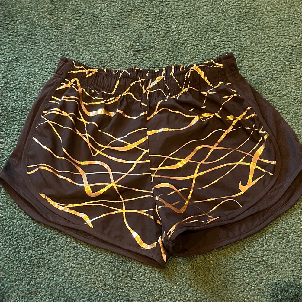 Nike Black and Gold women’s running shorts size small
